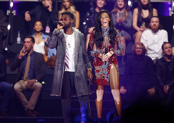 Copyright 2016 The Associated Press. All rights reserved. This material may not be published, broadcast, rewritten or redistributed without permission. Mandatory Credit: Photo by Peter Dejong/AP/REX/Shutterstock (7391406i) Tinie Tempah, left and Winnie Harlow present an award, during the MTV European Music Awards 2016, in Rotterdam, Netherlands Netherlands MTV EMA 2016, Rotterdam, Netherlands - 06 Nov 2016