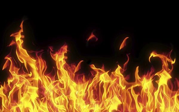 flame isolated over black background