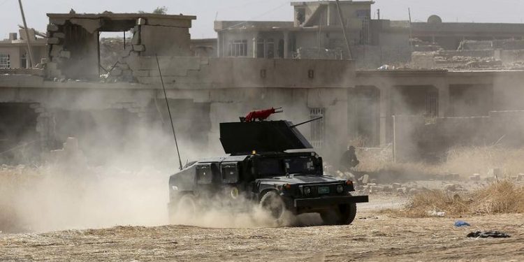 Iraqi forces are deployed during an offensive to retake Mosul from Islamic State militants outside Mosul, Iraq, Monday, Oct. 17, 2016. Columns of Iraqi and Kurdish forces backed by U.S.-led airstrikes slowly advanced on Mosul from several directions on Monday, launching a long-awaited operation to retake Iraq's second largest city from the Islamic State group. (AP Photo/Khalid Mohammed)