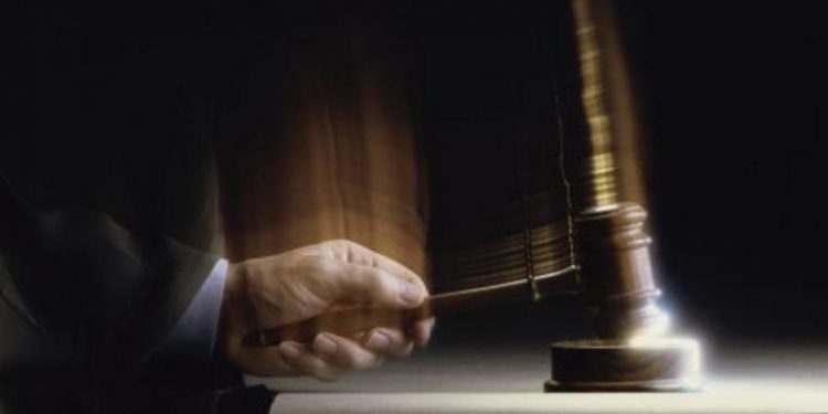 Close-up of a judge handing down a verdict