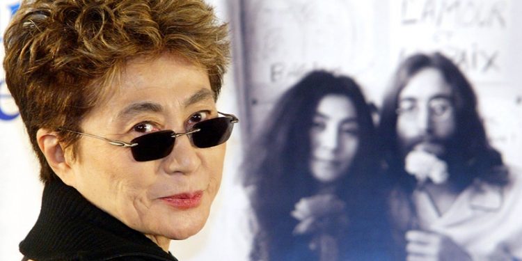 TOK09 - 20021209 - SAITAMA, JAPAN : Yoko Ono poses for photographers during a press conference before a charity concert to commemorate her late husband John Lennon in Saitama, suburban Tokyo, 09 December 2002, one day after the 22nd aniversary of his death. About 14,000 people gathered at the concert today to raise a fund to build elementary schools in Asia and Africa.      
EPA PHOTO AFPI