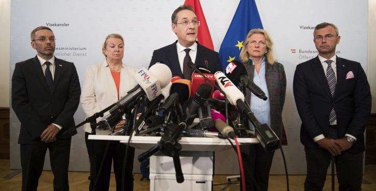 Austrian Vice Chancellor Heinz-Christian Strache (Austrian Freedom Party), center, addresses the media during press conference at the sport ministry in Vienna, Austria, Saturday, May 18, 2019. Strache says he is resigning after two German newspapers published footage of him apparently offering lucrative government contracts to a potential Russian benefactor. (AP Photo/Michael Gruber)