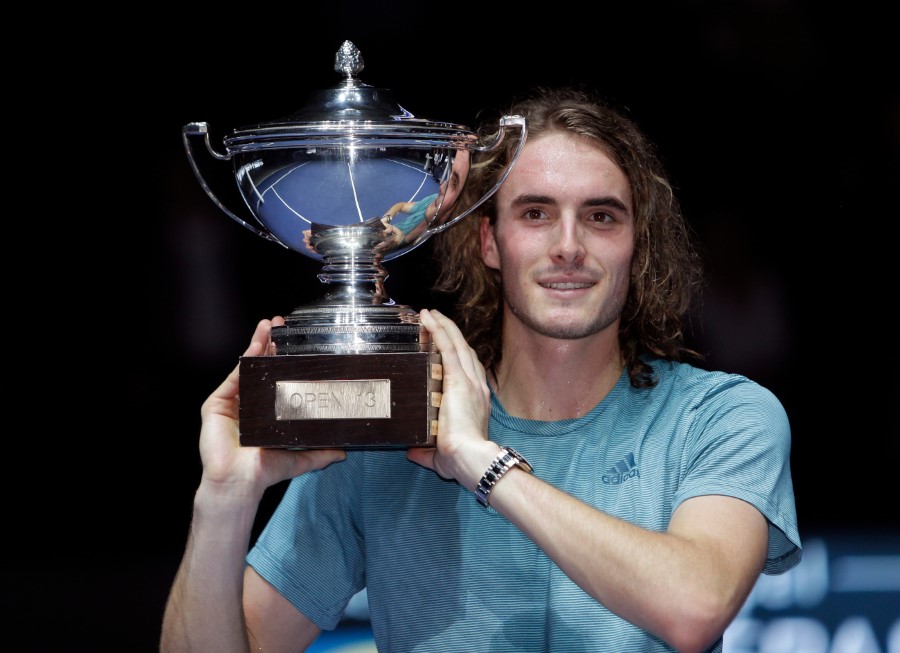 Stefanos Tsitsipas of Greece holds his trophy after defeating Mikhail Kukushkin of Kazakhstan in the final match at the Open 13 Provence tennis tournament in Marseille, southern France, Sunday Feb. 24, 2019. (AP Photo/Claude Paris)