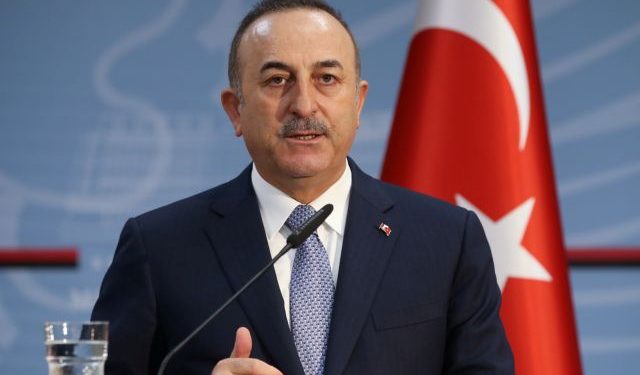 Turkish Foreign Minister Cavusoglu speaks during a news conference in Tirana