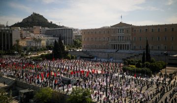 Members of the communist-affiliated trade union PAME practice social distancing during a rally commemorating May Day, following the coronavirus disease (COVID-19) outbreak, in Athens, Greece, May 1, 2020. REUTERS/Alkis Konstantinidis