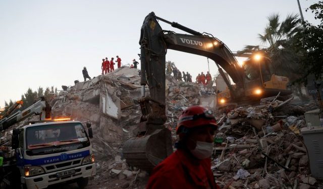 Rescue workers search for earthquake survivors in Izmir