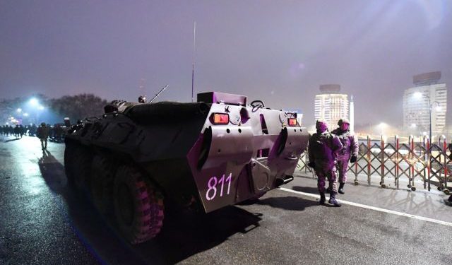 An armoured personnel carrier is seen near the mayor's office during protests triggered by fuel price increase in Almaty, Kazakhstan January 5, 2022. REUTERS/Stringer