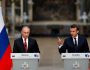 French President Emmanuel Macron and Russian President Vladimir Putin give a joint press conference at the Chateau de Versailles before the opening of an exhibition marking 300 years of diplomatic ties between the two countries in Versailles