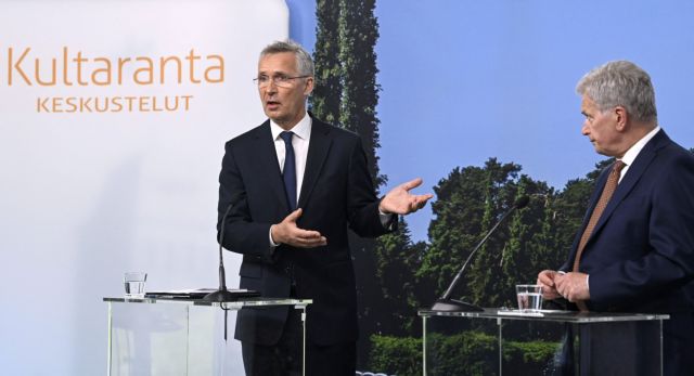 NATO Secretary General Jens Stoltenberg speaks as Finnish President Sauli Niinisto listens at a press conference during Kultaranta Talks, hosted by Finnish President at the Presidential Summer residence Kultaranta, in Naantali, Finland, June 12, 2022. Lehtikuva/Markku Ulander via REUTERS ATTENTION EDITORS - THIS IMAGE WAS PROVIDED BY A THIRD PARTY. NO THIRD PARTY SALES. NOT FOR USE BY REUTERS THIRD PARTY DISTRIBUTORS. FINLAND OUT. NO COMMERCIAL OR EDITORIAL SALES IN FINLAND.