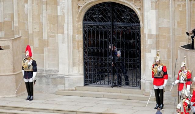 The gates are locked after the coffin of Her Majesty Queen Elizabeth II enters St George VI Chapel at Windsor Castle, September 19, 2022. The UK Armed Forces have played a part in the procession for Her Majesty The Queen’s funeral and committal service today, in London and Windsor. Marking the end to 10 days of proceedings, service personnel representing a variety of regiments, ships and air stations that held a special relationship with Her Majesty The Queen took part in the funeral processions in London and Windsor. Around 4,000 regular and reserve soldiers, sailors, marines and aviators, as well as musicians from Armed Forces bands, took part in the proceedings today. This included over 3,000 military personnel in central London, with 1,650 personnel forming part of the procession from the Palace of Westminster to Westminster Abbey and procession from Westminster Abbey to Wellington Arch. In Windsor, over 1,000 military personnel were involved in ceremonial activity, including 410 taking part in the procession from Albert Road, Windsor, to St George’s Chapel, Windsor Castle. The proceedings in London saw the Bearer Party, formed of personnel from The Queen’s Company, 1st Battalion The Grenadier Guards, transfer Her Majesty The Queen’s Coffin from Westminster Hall to the State Gun Carriage, which was pulled by 142 Naval Ratings to Westminster Abbey. PO Phot Dave Jenkins/Pool via REUTERS