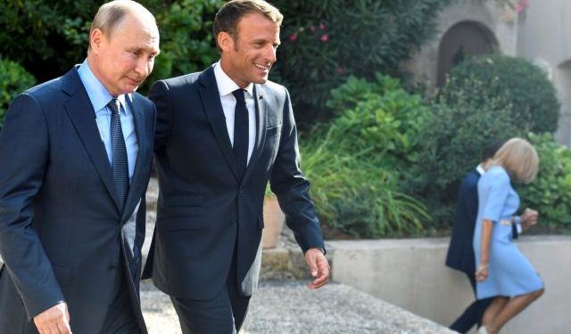 French President Emmanuel Macron welcomes Russia's President Vladimir Putin, at his summer retreat of the Bregancon fortress on the Mediterranean coast, near the village of Bormes-les-Mimosas, southern France, on August 19, 2019. Gerard Julien/Pool via REUTERS