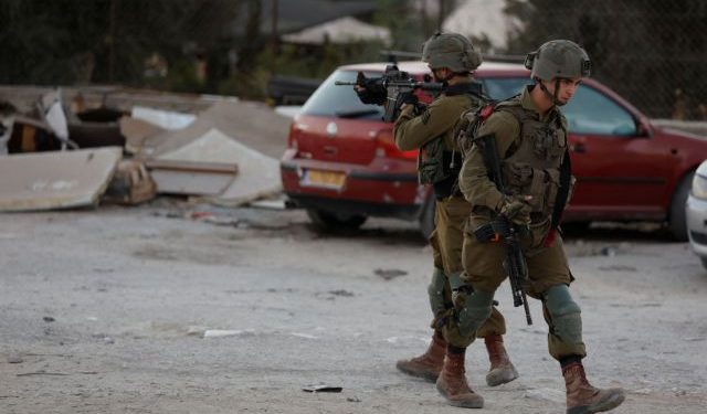 Israeli soldiers patrol Anata during a manhunt following a shooting incident at a checkpoint in East Jerusalem October 9, 2022. REUTERS/Ammar Awad