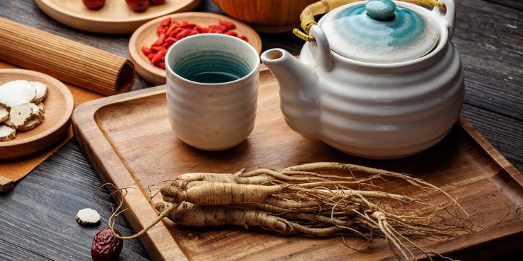 Ginseng and tea cup are on the table