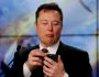 FILE PHOTO: Elon Musk looks at his mobile phone in Cape Canaveral, Florida, U.S. January 19, 2020. REUTERS/Joe Skipper//File Photo