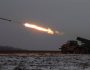 Ukrainian servicemen fire a BM-21 Grad multiple launch rocket system towards Russian positions on a frontline near the town of Bakhmut