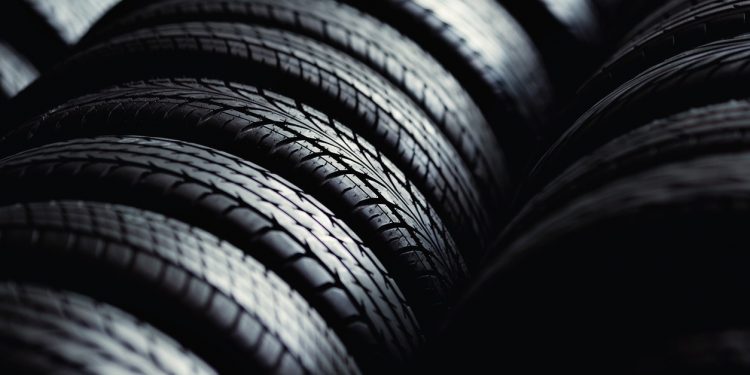 Angled photo of stacks of different patterned tires