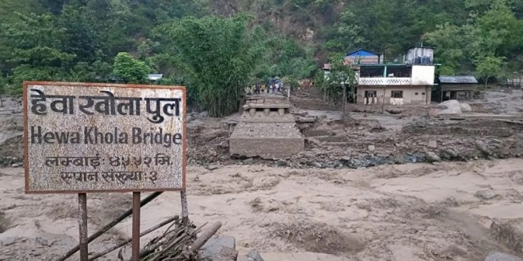 floods-damaged-a-bridge-in-panchthar-nepal-june-2023-768x433
