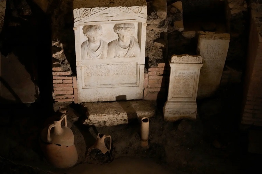 tomb-stones-displayed-inside-ancient-72304359