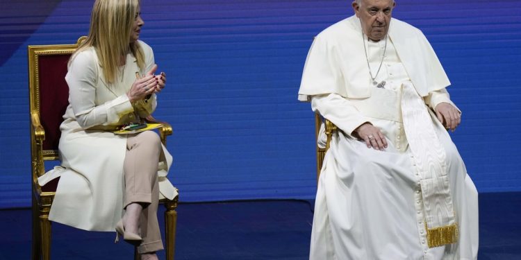 Pope Francis and Giorgia Meloni attend a conference on birthrate, at Auditorium della Conciliazione, in Rome, Friday, May 12, 2023. (AP Photo/Alessandra Tarantino)