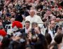 Pope Francis waves on the day of the Easter Mass, at St. Peter's Square at the Vatican, March 31, 2024. REUTERS/Yara Nardi