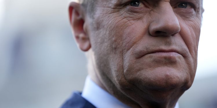 Polish Prime Minister Donald Tusk talks with reporters outside the West Wing of the White House after meeting with President Joe Biden Tuesday, March 12, 2024, in Washington. (AP Photo/Andrew Harnik)