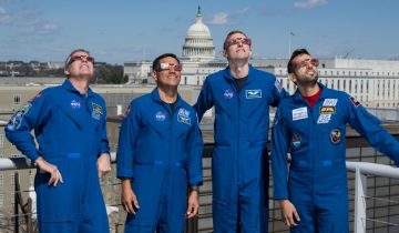 NASA astronauts Stephen Bowen, left, Frank Rubio, Warren Hoburg, and UAE (United Arab Emirates) astronaut Sultan Alneyadi, right, pose for a photo wearing solar glasses, Tuesday, March 19, 2024, at the Mary W. Jackson NASA Headquarters building in Washington. Bowen, Hoburg, and Alneyadi spent 186 days aboard the International Space Station as part of Expedition 69; while Rubio set a new record for the longest single spaceflight by a U.S. astronaut, spending 371 days in orbit on an extended mission spanning Expeditions 68 and 69. Photo Credit: (NASA/Aubrey Gemignani)