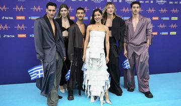 Greek singer Marina Satti (3R) poses with band members on the turquoise carpet before the opening ceremony for the 68th edition of the Eurovision Song Contest ESC at Malmo Live concert venue, in Malmo, Sweden, on May 5, 2024. A week of Eurovision Song Contest festivities kicked off Saturday, on May 4, in the southern Swedish town of Malmo, with 37 countries taking part. The first semi-final takes place on Tuesday, May 7, the second on Thursday, May 9, and the grand final concludes the event on May 11. Thousands of people are expected to attend pro-Palestinian rallies throughout the week in Malmo. (Photo by Jessica Gow/TT / TT News Agency / AFP) / Sweden OUT