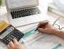 Polish individual income tax return. Accountant working with Polish tax forms