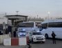 Israeli buses enter the Ofer military prison near Jerusalem on Sunday, Jan. 19, 2025. (AP Photo/Mahmoud Illean)