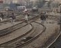 Egyptian passengers cross rial ways in Cairo, Egypt, Thursday, March 13, 2025. (AP Photo/Amr Nabil)