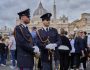 Carabinieri paramilitary police patrol St. Peter's Square as people line up to enter St. Peter's Basilica where Pope Francis is lying in state, at the Vatican, Thursday, April 24, 2025. (AP Photo/Bernat Armangue)