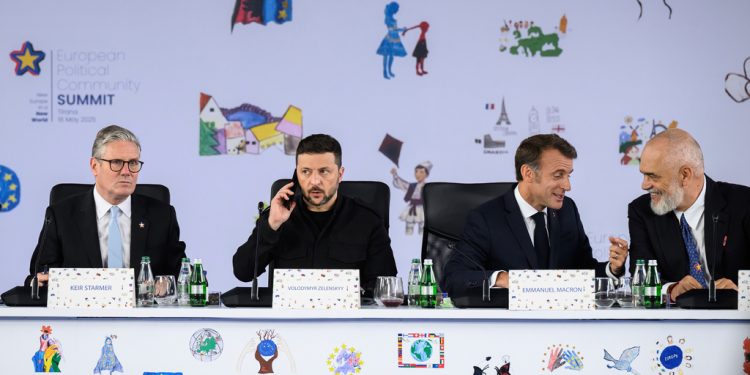 From left, Britain's Prime Minister Keir Starmer, Ukraine's President Volodymyr Zelenskyy, France's President Emmanuel Macron and Albania's Prime Minister Edi Rama attend a plenary meeting at the beginning of a summit where the leaders of 47 European countries and organizations will discuss security, defense and democratic standards, in Tirana, Albania, Friday, May 16, 2025. (Leon Neal/Pool via AP)