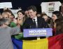 Presidential candidate Nicusor Dan speaks to media after polls closed for the second round of the country's presidential election redo in Bucharest, Romania, Sunday, May 18, 2025. (AP Photo/Andreea Alexandru)
